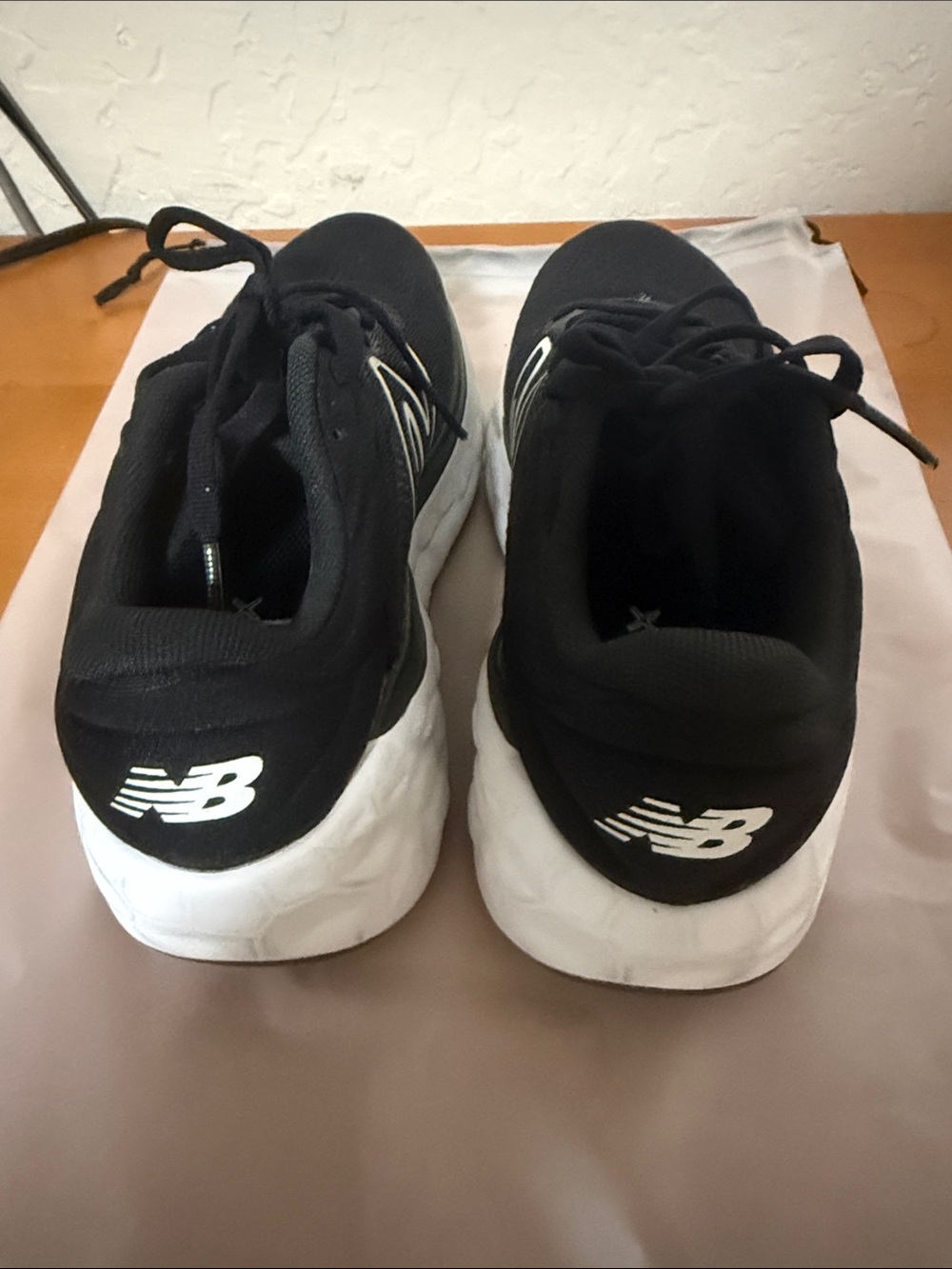 New Balance Black and White Women's Slip-On Style Sneakers